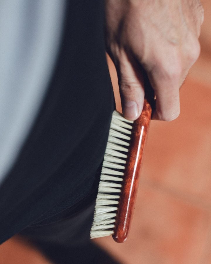 The Benefits of a Clothes Brush and How To Use One