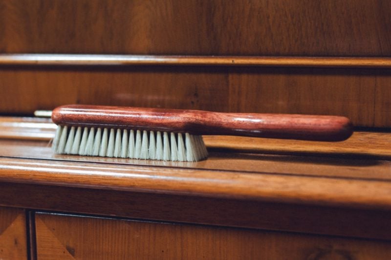 The Benefits of a Clothes Brush and How To Use One