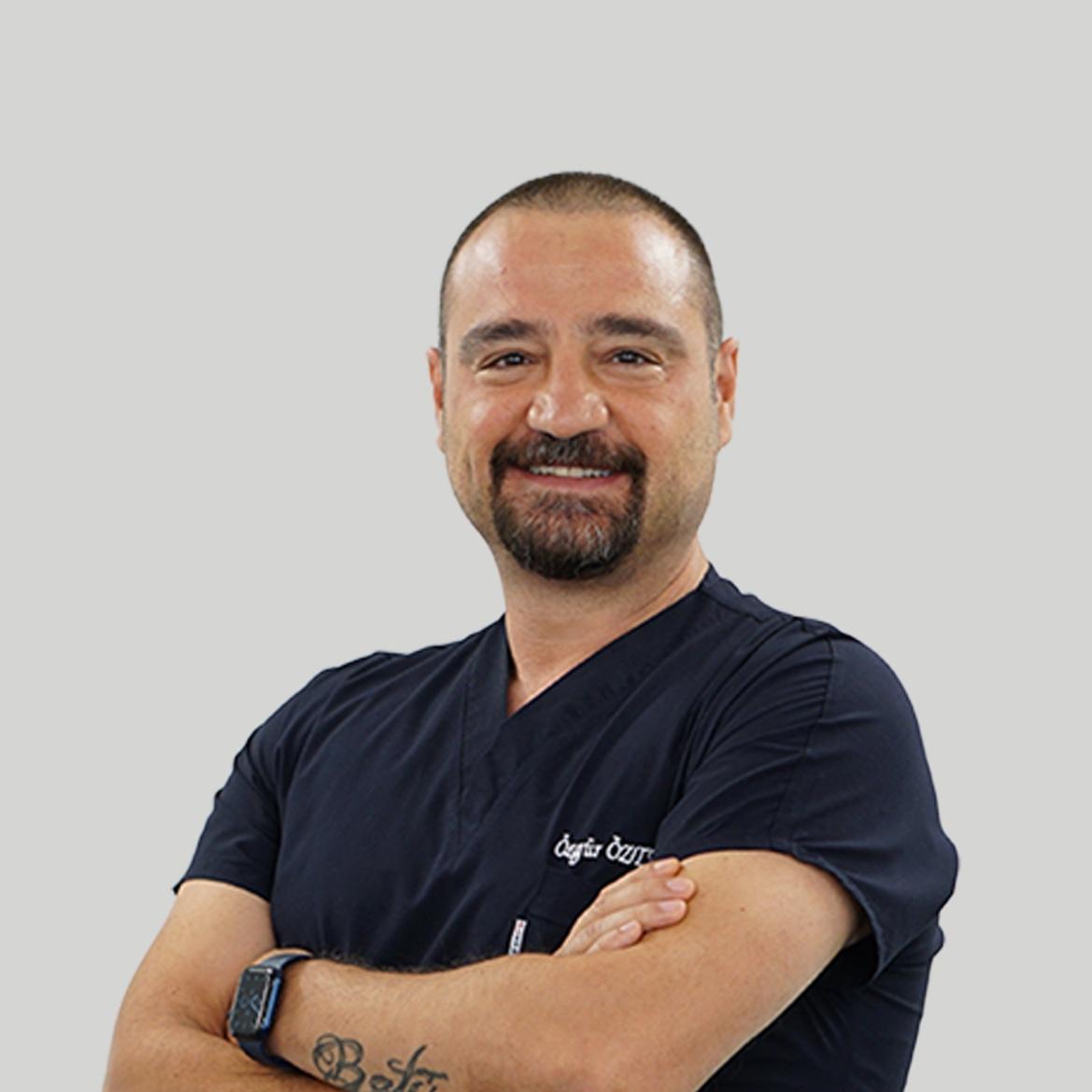 A person with a beard and mustache wearing a black shirt AI-generated content may be incorrect.